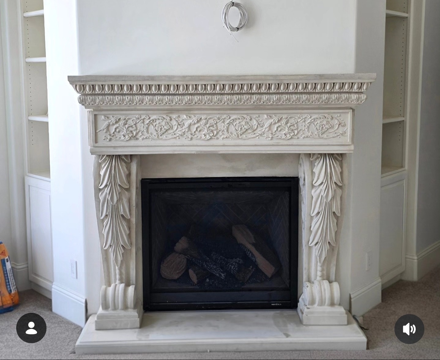 Custom classical architectural precast fireplace mantel with carved decorative corbels installed by Lions Precast in Fresno California