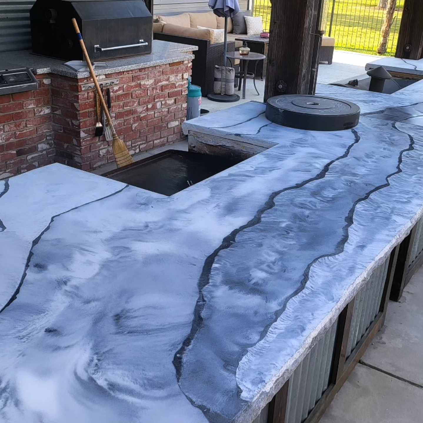Custom decorative concrete outdoor kitchen countertop installed by Lions Precast in Fresno California