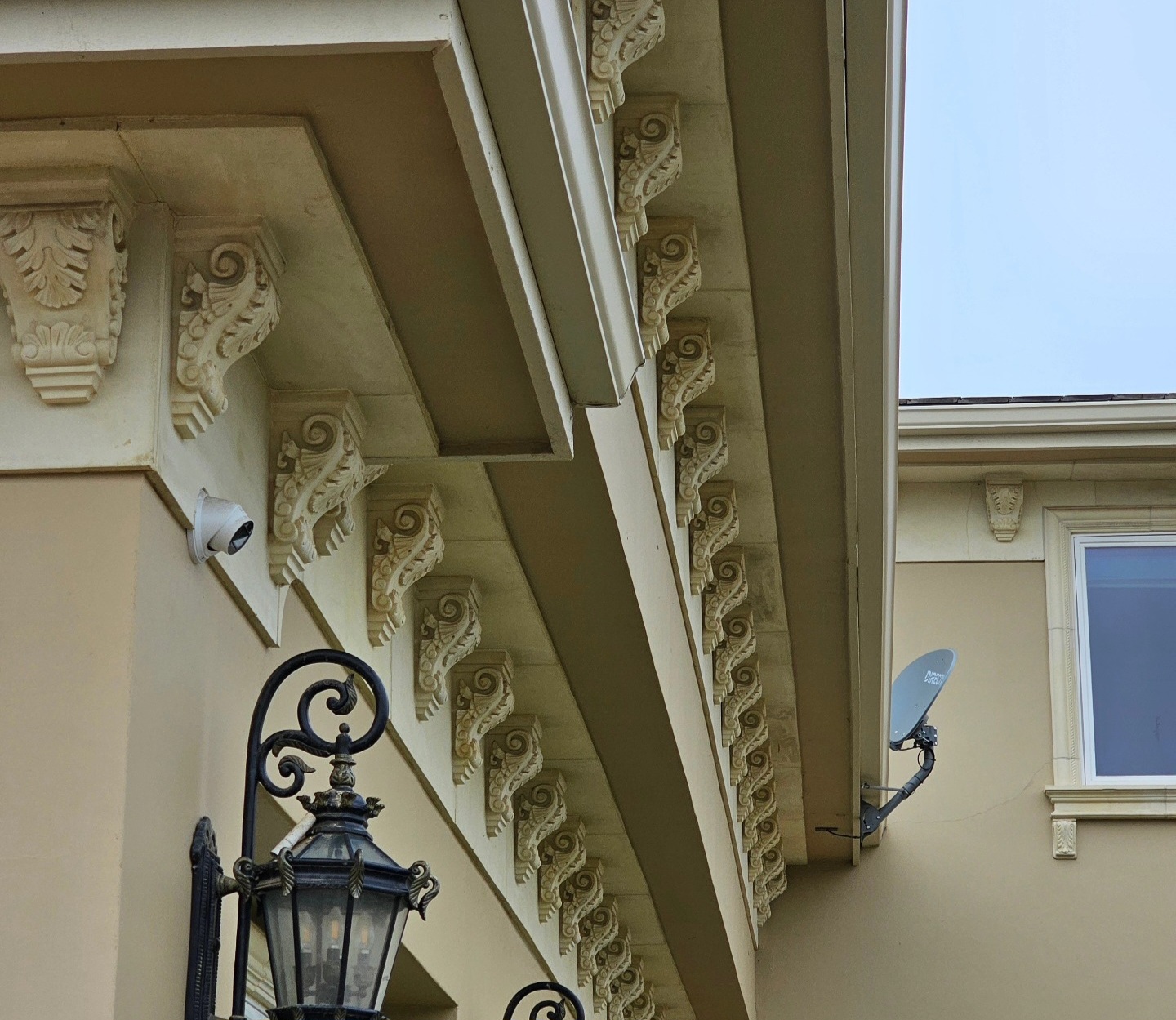Architectural precast corbels installed along roof eaves by Lions Precast on luxury home in Fresno California