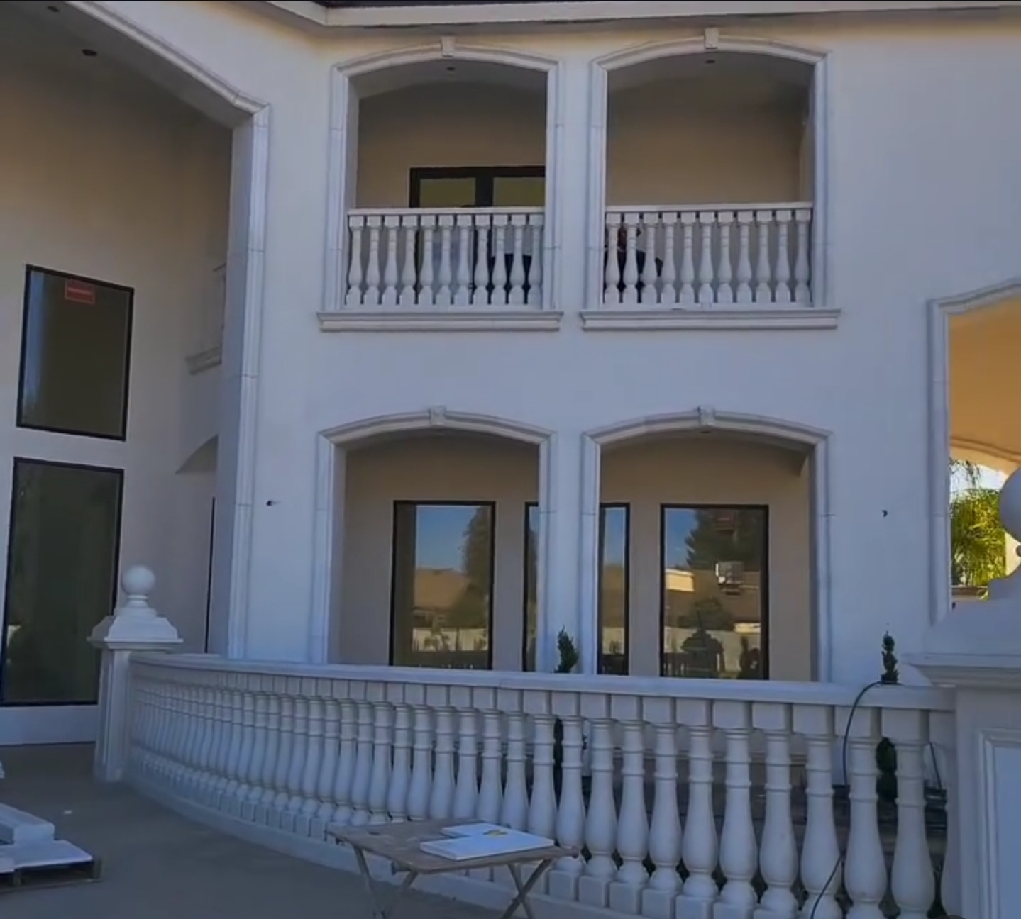Architectural precast balcony balustrades and arch trim installed by Lions Precast on luxury home in Fresno California