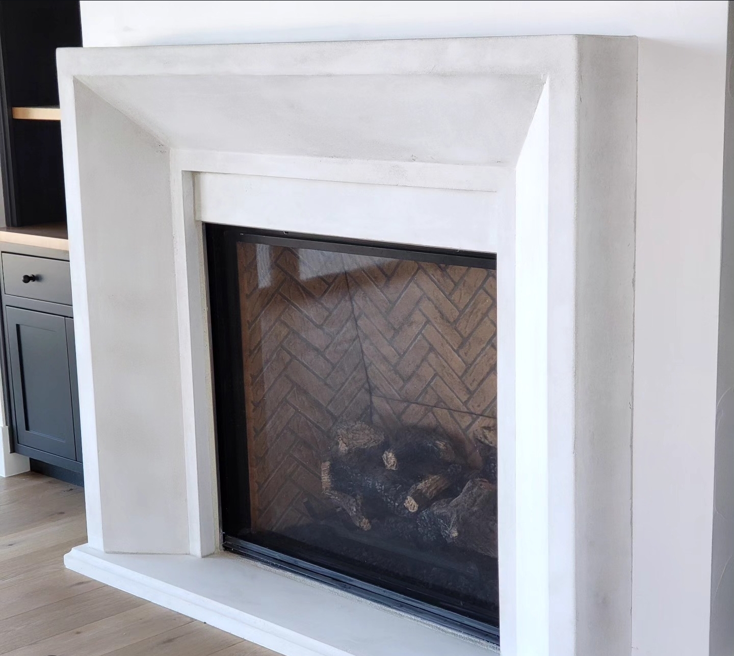 Modern architectural precast concrete fireplace surround installed by Lions Precast in Fresno California