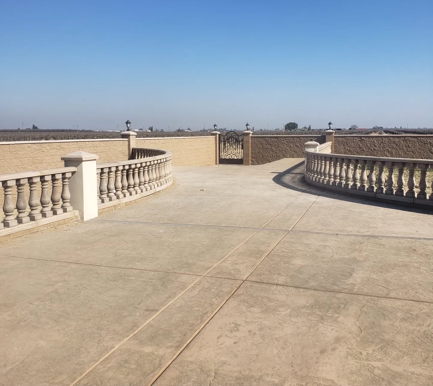 Curved architectural precast balustrade railing installed by Lions Precast on residential driveway in Fresno California